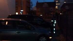 An Ottawa ticket officer checks with park patrons before ticketing a car