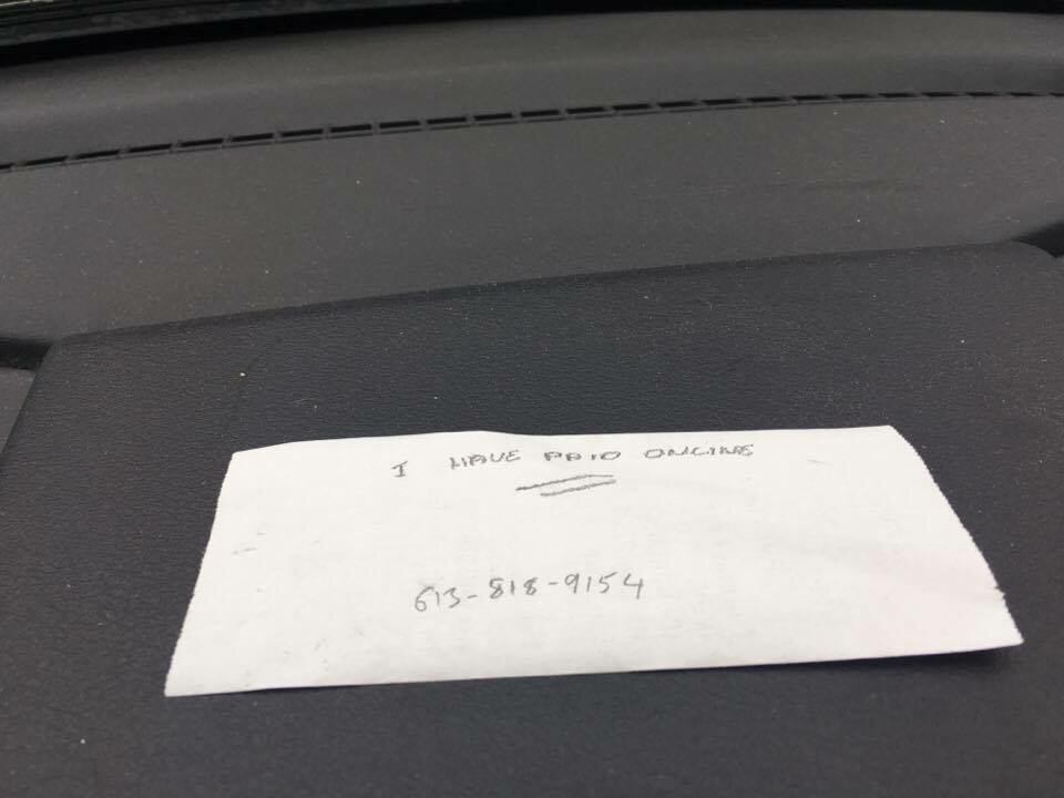 Browne puts this note on his dashboard when he leaves his car at the parking lot close to his girlfriend's new house. Photo credits: Alex Mazur