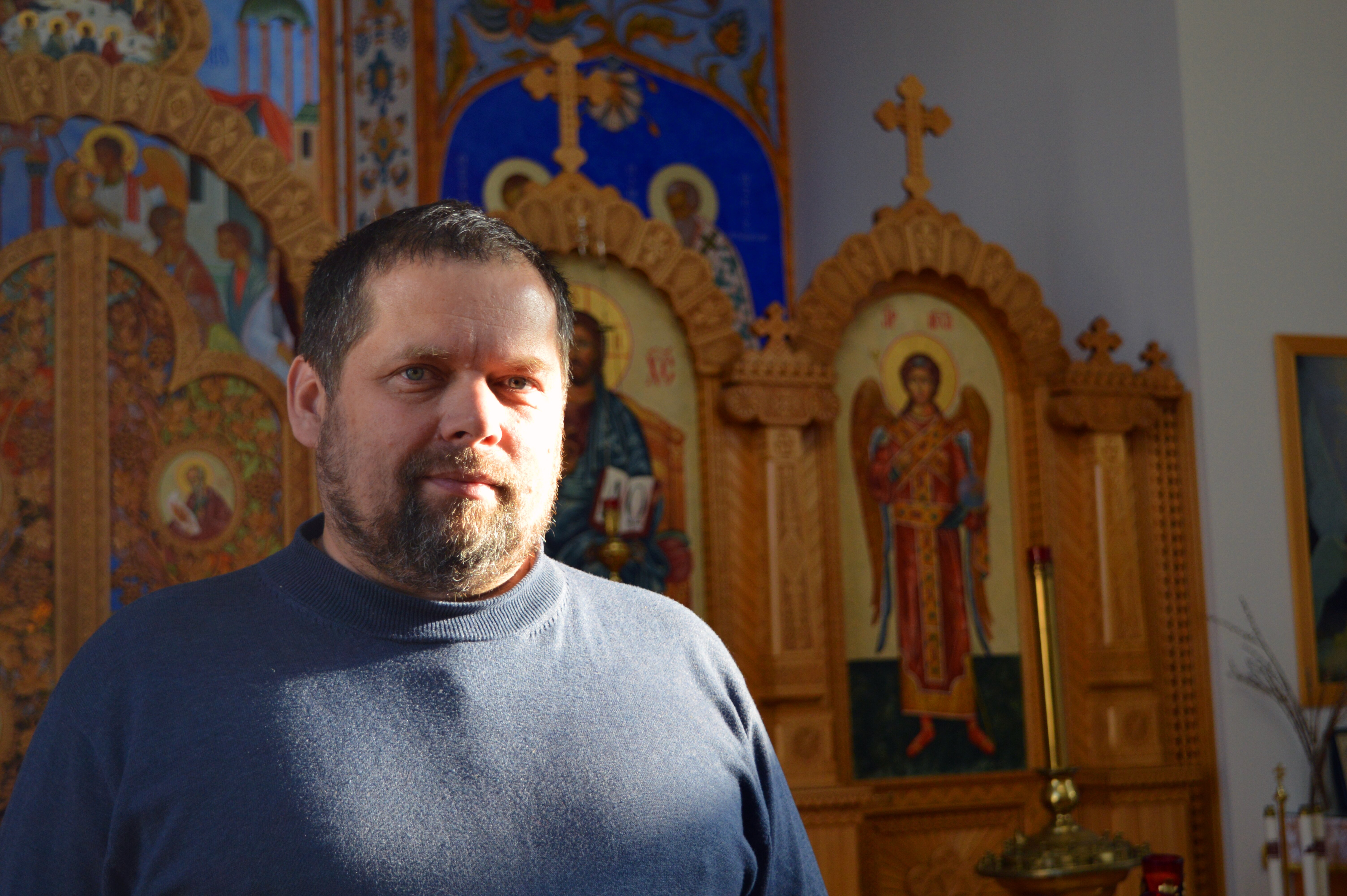 Father Ihor Okhrimtchouk stands inside Assumption of the Virgin Ukrainian Catholic Cathedral on 1000 Byron Ave. Photo credits to Sydney LaRose.